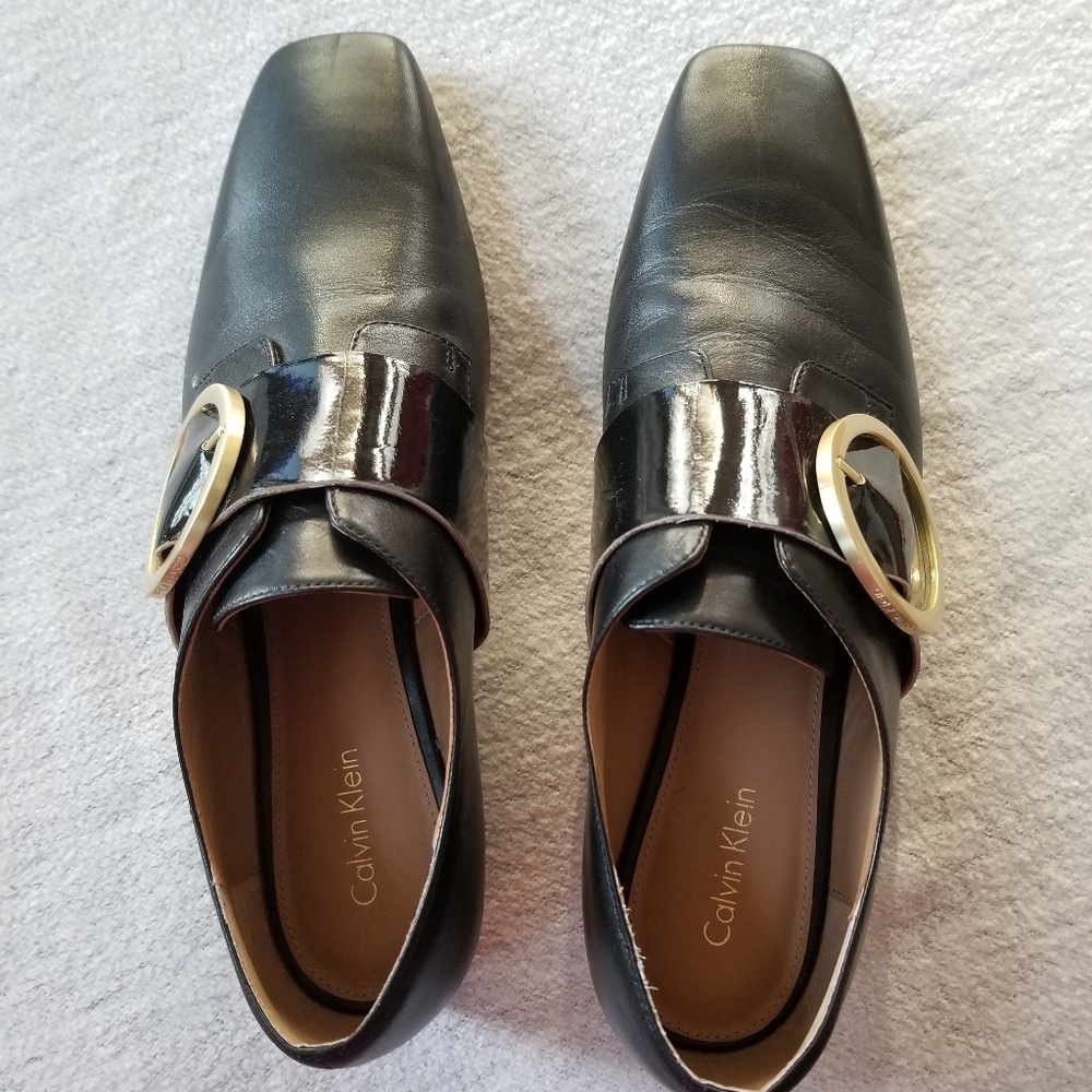 Calvin Klein black leather flats